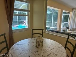 672 Seagrape Dr, Marco Island, FL 34145 - dining area with healthy amount of natural light