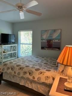 672 Seagrape Dr, Marco Island, FL 34145 - bedroom with ceiling fan