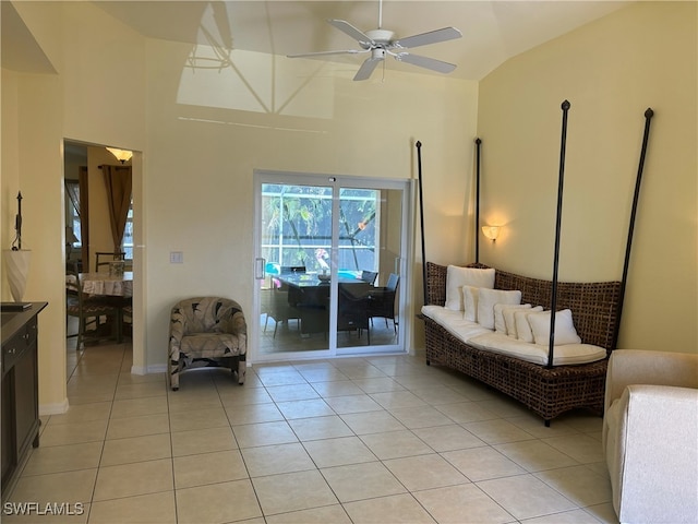 672 Seagrape Dr, Marco Island, FL 34145 - living room with ceiling fan, light tile patterned floors, and high vaulted ceiling
