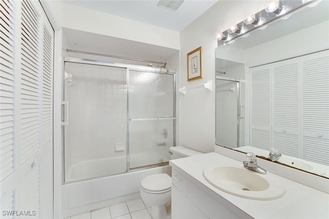 7340 Coventry Ct Unit 827, Naples, FL 34104 - full bathroom with a closet, tile patterned floors, vanity, and bath / shower combo with glass door