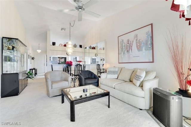 7340 Coventry Ct Unit 827, Naples, FL 34104 - carpeted living area featuring high vaulted ceiling and ceiling fan