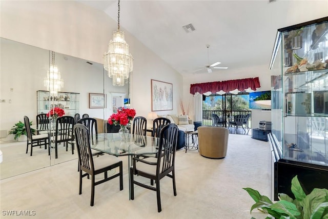 7340 Coventry Ct Unit 827, Naples, FL 34104 - dining room with a chandelier, carpet, a ceiling fan, and high vaulted ceiling