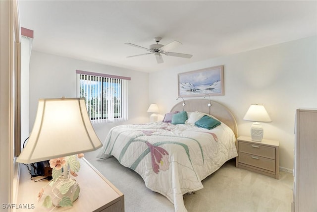 7340 Coventry Ct Unit 827, Naples, FL 34104 - bedroom with light carpet and a ceiling fan