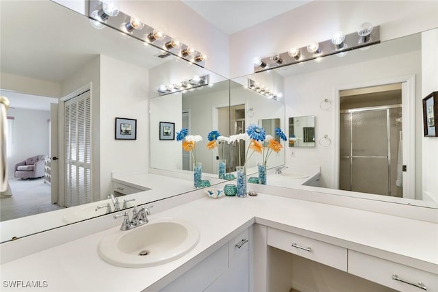 7340 Coventry Ct Unit 827, Naples, FL 34104 - ensuite bathroom with a stall shower and vanity