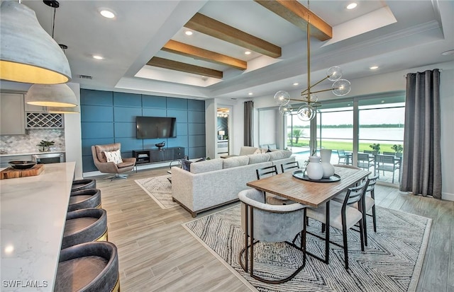 7393 Blue Salvia Dr, North Fort Myers, FL 33917 - living room featuring a raised ceiling, light wood finished floors, recessed lighting, and a chandelier