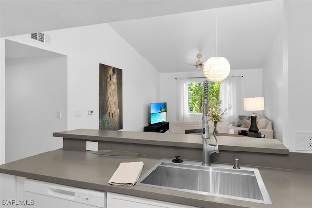 8224 Key Royal Cir Unit 232, Naples, FL 34119 - kitchen with a sink, white dishwasher, open floor plan, dark countertops, and lofted ceiling
