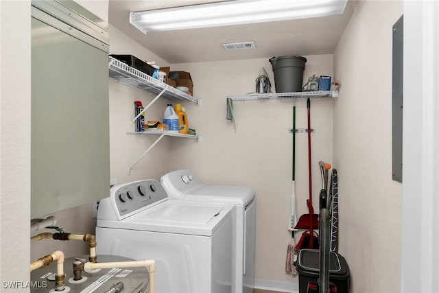8224 Key Royal Cir Unit 232, Naples, FL 34119 - laundry area featuring washing machine and dryer