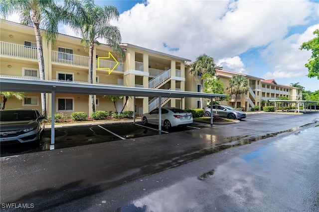 8224 Key Royal Cir Unit 232, Naples, FL 34119 - view of covered parking lot
