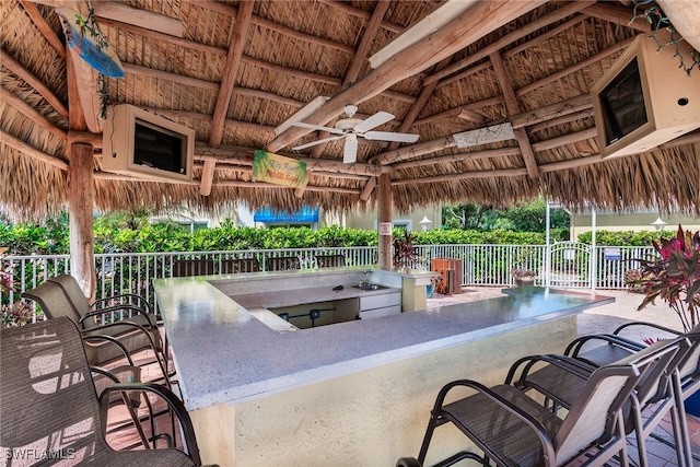 8224 Key Royal Cir Unit 232, Naples, FL 34119 - view of patio / terrace featuring a gazebo, a ceiling fan, and area for grilling