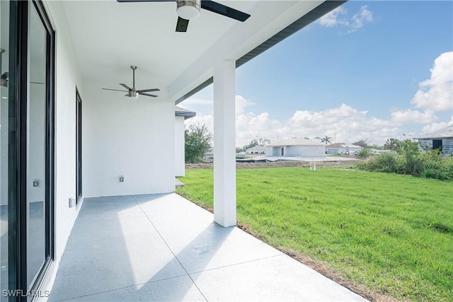 1245 Echard St E, Lehigh Acres, FL 33974 - view of patio featuring ceiling fan
