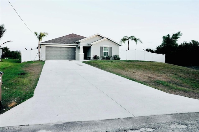 332 Pembroke St, Lehigh Acres, FL 33974 - single story home with an attached garage, concrete driveway, and stucco siding