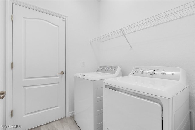 11226 Shady Blossom Dr, Fort Myers, FL 33913 - washroom featuring washing machine and clothes dryer