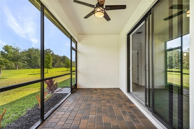 11226 Shady Blossom Dr, Fort Myers, FL 33913 - unfurnished sunroom with ceiling fan