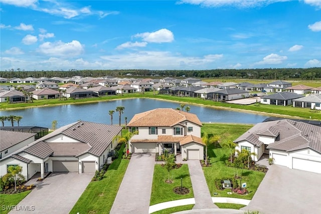20669 Greenwich Pl, Estero, FL 33928 - aerial perspective of suburban area with a large body of water