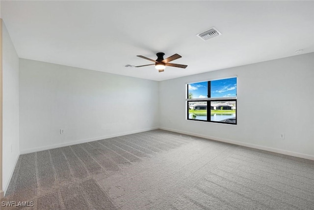 20669 Greenwich Pl, Estero, FL 33928 - carpeted spare room featuring a ceiling fan and baseboards