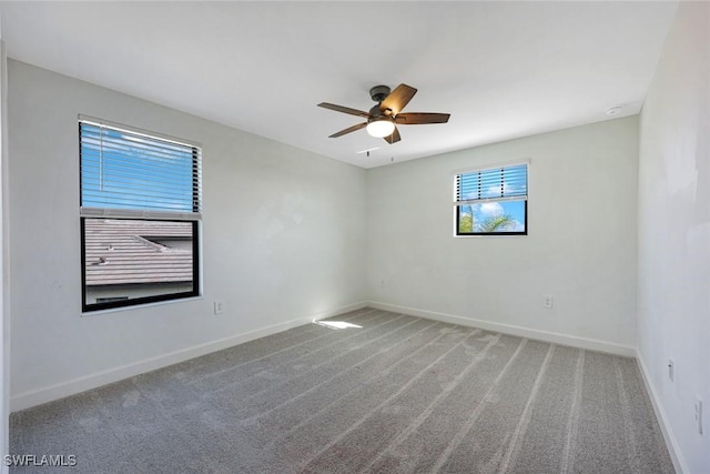 20669 Greenwich Pl, Estero, FL 33928 - empty room featuring a ceiling fan and carpet flooring