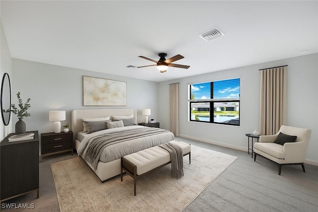 20669 Greenwich Pl, Estero, FL 33928 - carpeted bedroom with a ceiling fan and baseboards