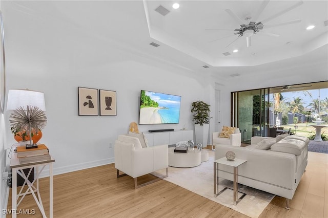 3813 Columbia Ct, Naples, FL 34119 - living area with a raised ceiling, light wood finished floors, a ceiling fan, and recessed lighting