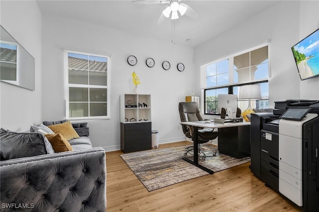 3813 Columbia Ct, Naples, FL 34119 - office area with a ceiling fan, light wood-style flooring, and baseboards