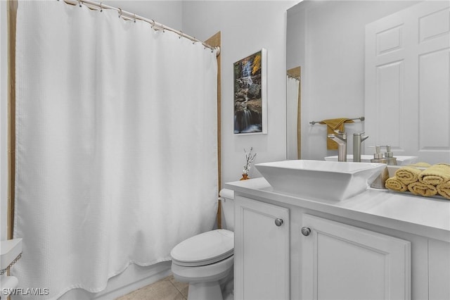 3813 Columbia Ct, Naples, FL 34119 - bathroom featuring toilet, vanity, tile patterned flooring, and shower / bath combo