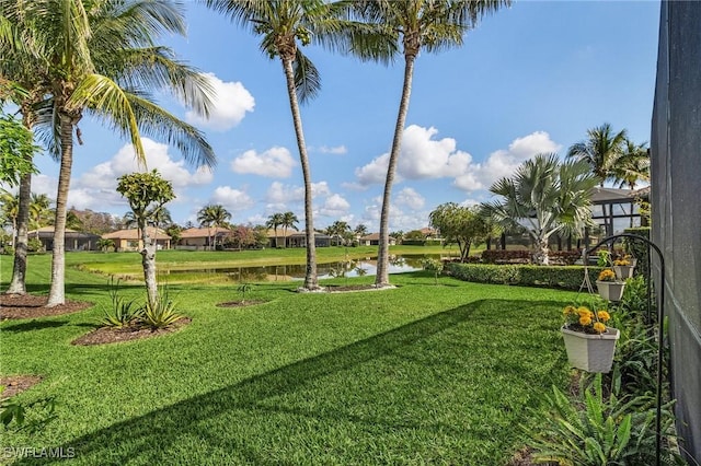 3813 Columbia Ct, Naples, FL 34119 - view of grassy yard featuring a water view