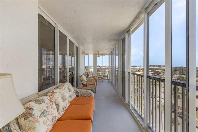 7150 Estero Blvd Unit 706, Fort Myers Beach, FL 33931 - sunroom featuring floor to ceiling windows and a textured ceiling