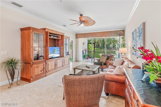 11111 Corsia Trieste Way Unit 101, Bonita Springs, FL 34135 - living area with ornamental molding, ceiling fan, and light tile patterned floors
