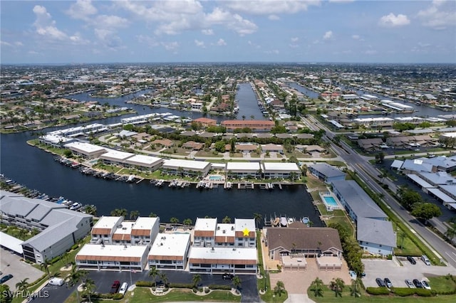 4210 SE 20th Pl Unit A8, Cape Coral, FL 33904 - aerial perspective of suburban area featuring a nearby body of water