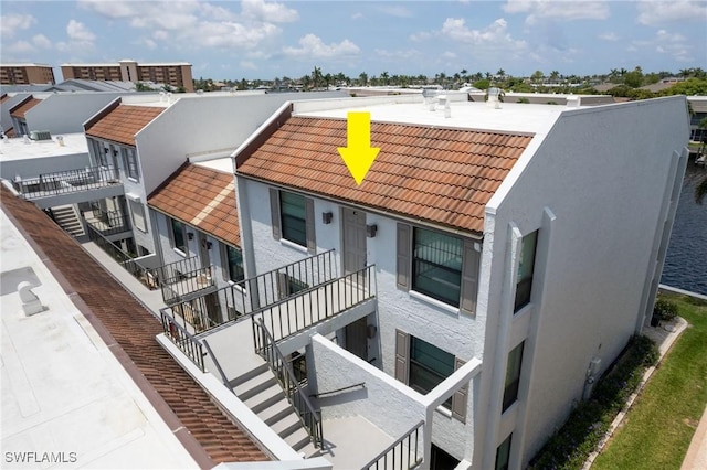4210 SE 20th Pl Unit A8, Cape Coral, FL 33904 - view of building exterior with stairs