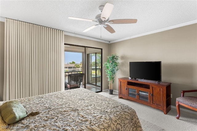 4210 SE 20th Pl Unit A8, Cape Coral, FL 33904 - bedroom with access to outside, carpet flooring, a textured ceiling, ornamental molding, and a ceiling fan