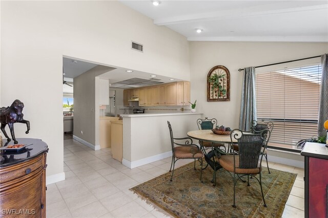 4210 SE 20th Pl Unit A8, Cape Coral, FL 33904 - dining space with light tile patterned floors, beamed ceiling, baseboards, high vaulted ceiling, and recessed lighting