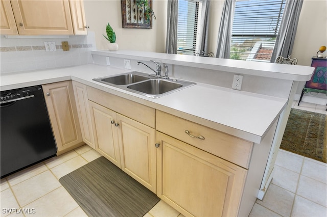 4210 SE 20th Pl Unit A8, Cape Coral, FL 33904 - kitchen with black dishwasher, light brown cabinetry, a sink, and a peninsula