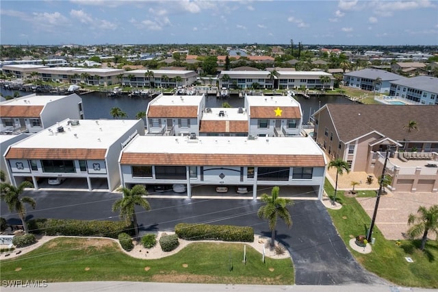 4210 SE 20th Pl Unit A8, Cape Coral, FL 33904 - aerial perspective of suburban area featuring a large body of water