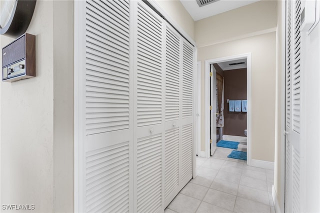 4210 SE 20th Pl Unit A8, Cape Coral, FL 33904 - corridor with light tile patterned floors and baseboards