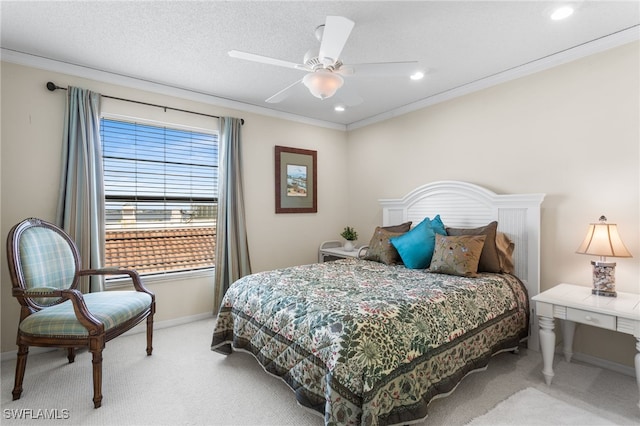 4210 SE 20th Pl Unit A8, Cape Coral, FL 33904 - bedroom with light carpet, ornamental molding, baseboards, recessed lighting, and ceiling fan