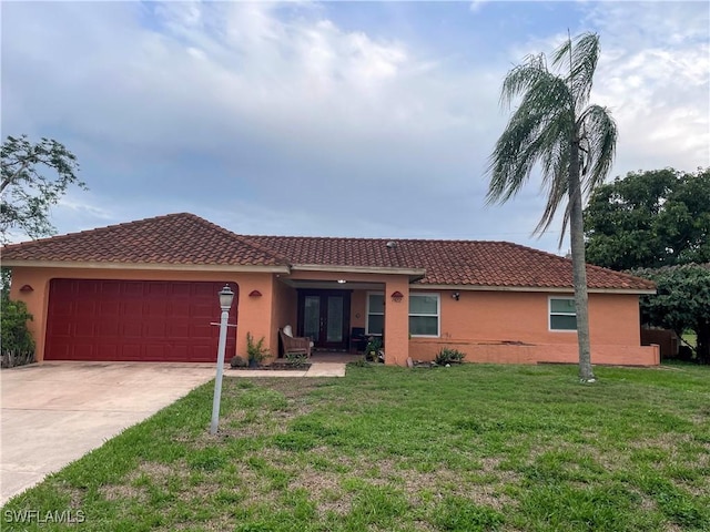 1422 Archer St, Lehigh Acres, FL 33936 - single story home featuring french doors, stucco siding, a garage, a front lawn, and driveway