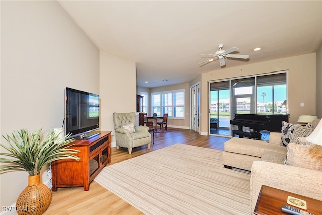 9231 Bayberry Bnd Unit 101, Fort Myers, FL 33908 - living room with wood finished floors, a ceiling fan, recessed lighting, and baseboards