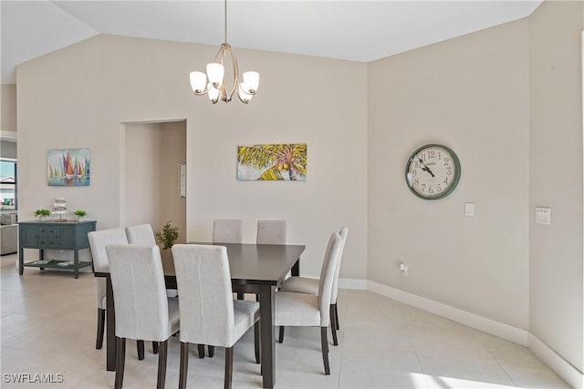 2519 SW 15th Ave, Cape Coral, FL 33914 - dining area with a chandelier, baseboards, light tile patterned floors, and lofted ceiling