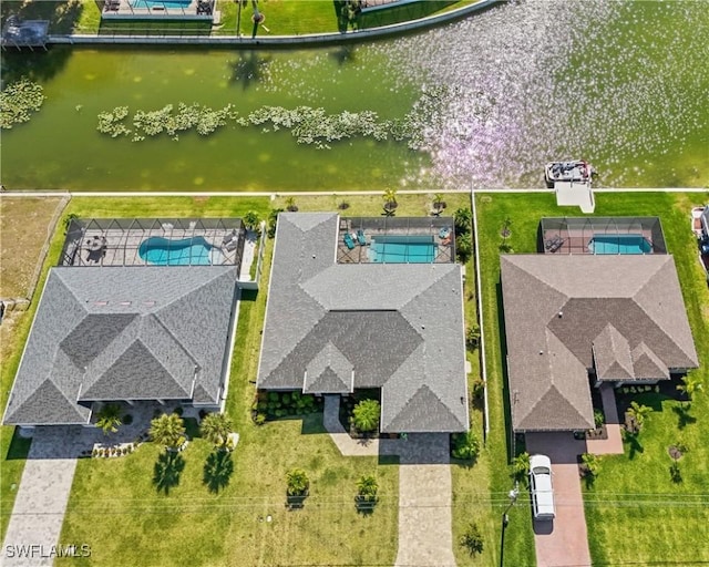 2519 SW 15th Ave, Cape Coral, FL 33914 - drone / aerial view of a pool area and a large body of water