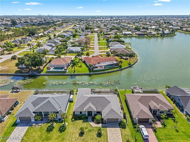 2519 SW 15th Ave, Cape Coral, FL 33914 - aerial perspective of suburban area featuring a nearby body of water