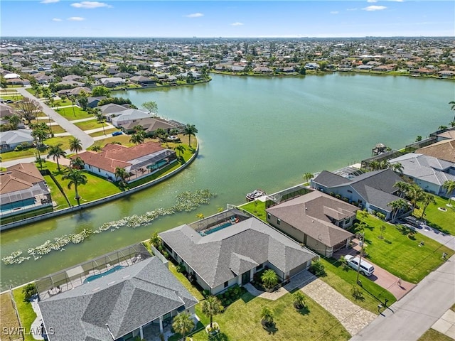 2519 SW 15th Ave, Cape Coral, FL 33914 - aerial perspective of suburban area featuring a large body of water