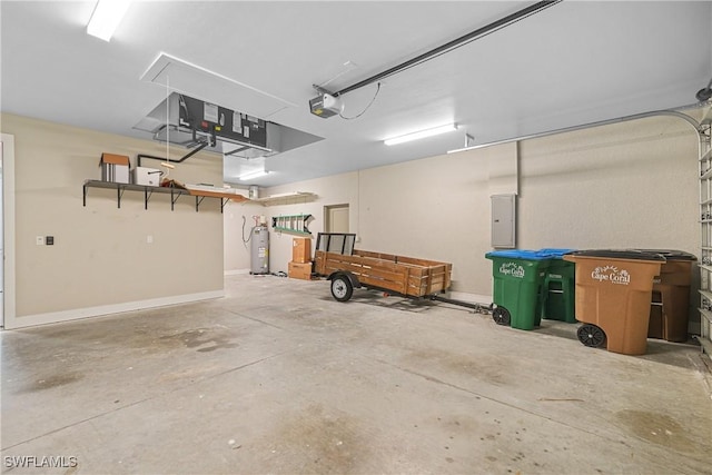 2519 SW 15th Ave, Cape Coral, FL 33914 - garage featuring a garage door opener, electric panel, and electric water heater