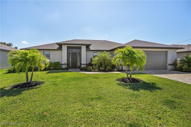 2519 SW 15th Ave, Cape Coral, FL 33914 - view of front of house featuring stucco siding, an attached garage, driveway, and a front lawn