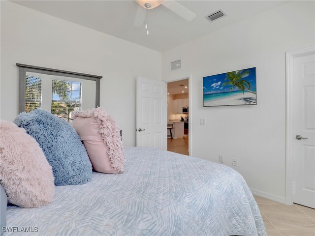 11796 Grand Belvedere Way Unit 202, Fort Myers, FL 33913 - bedroom with ceiling fan and baseboards