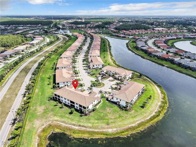 11796 Grand Belvedere Way Unit 202, Fort Myers, FL 33913 - aerial perspective of suburban area featuring a large body of water