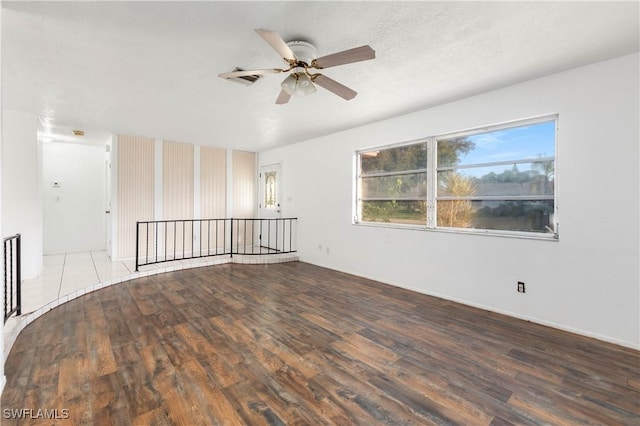 2330 Caladium Rd, Fort Myers, FL 33905 - empty room featuring wood finished floors and a ceiling fan
