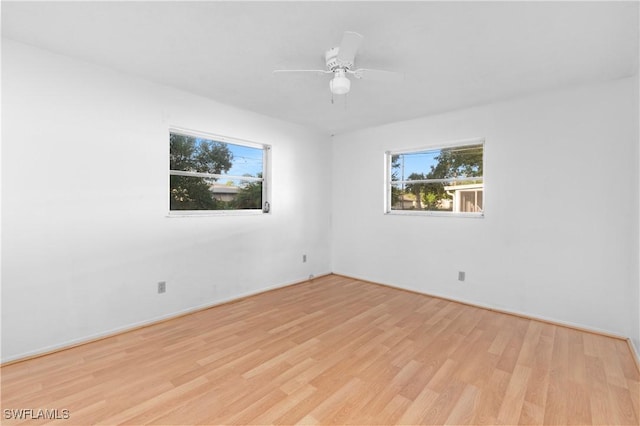 2330 Caladium Rd, Fort Myers, FL 33905 - unfurnished room featuring wood finished floors and a ceiling fan