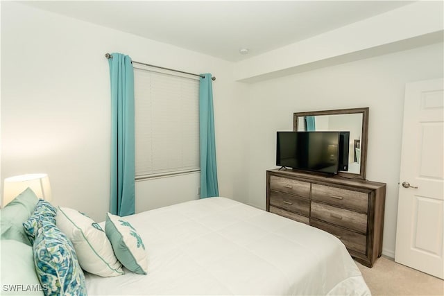 43000 Greenway Blvd Unit 114, Punta Gorda, FL 33982 - bedroom with light colored carpet