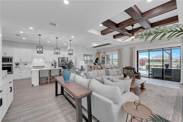 20150 Millrun Dr, Estero, FL 33928 - living room featuring ceiling fan, recessed lighting, light wood-type flooring, beam ceiling, and coffered ceiling