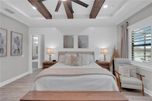 20150 Millrun Dr, Estero, FL 33928 - bedroom featuring beam ceiling, light wood finished floors, baseboards, connected bathroom, and recessed lighting